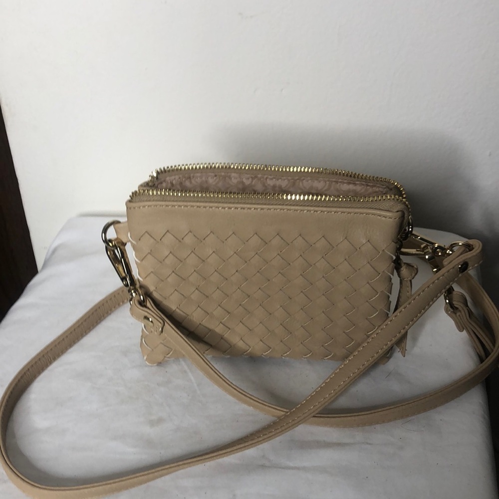 Charming Charlie woven  leather cross body wristlet purse​